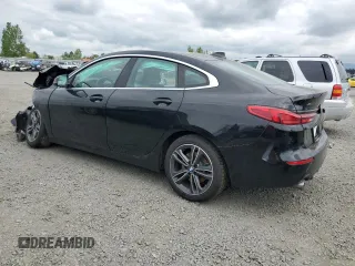 2021 BMW 2 Series 228i xDrive with VIN WBA73AK05M7H59412, listed as a Copart auction lot 54728865 with 56,718 mi miles and Clean Title. Bid and sale history available at carsss.com. Image 2.