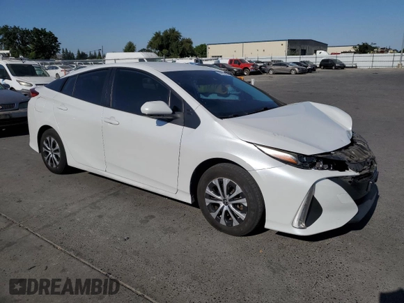 2021 Toyota Prius LE with VIN JTDKAMFP6M3191509, listed as a Copart auction lot 60153785 with 112,625 mi miles and Salvage title. Bid and sale history available at DreamBid. Image 4.