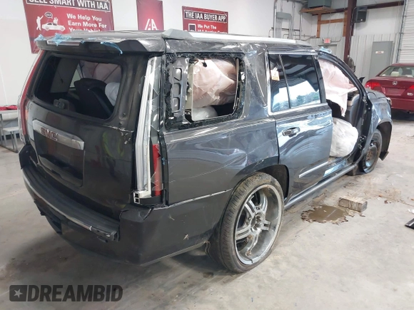 2016 GMC Yukon Denali with VIN 1GKS2CKJ8GR457661, listed as a IAAI auction lot 41522729 with 1 mi miles. Bid and sale history available at carsss.com. Image 4.