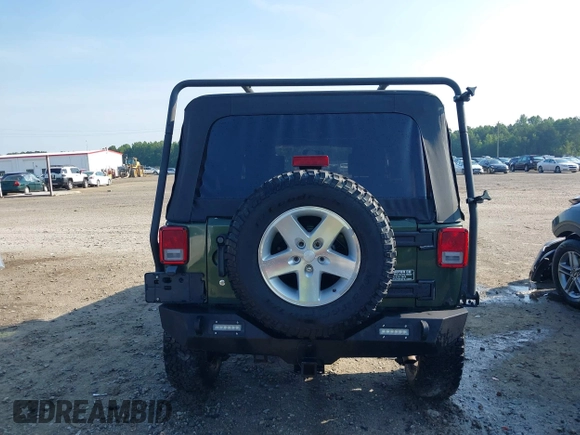 2007 Jeep Wrangler Unlimited X с VIN 1J4GA39197L115109, выставлен на аукционе IAAI как лот 42582190 с пробегом 141 080 миль миль и . История ставок и продаж доступна на DreamBid. Изображение 16.