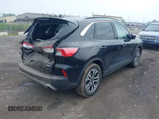 2020 Ford Escape SEL z VIN 1FMCU9H6XLUA29433, wystawiony jako IAAI lot #42446183 z przebiegiem 52 089 mil mil oraz . Historia ofert i sprzedaży dostępna na DreamBid. Obrazek 4.