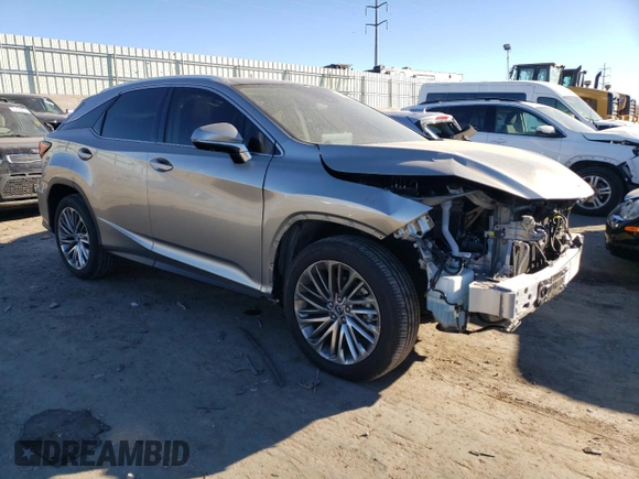 2022 Lexus RX with VIN 2T2JZMAA7NC257707, listed as a Copart auction lot 83791524 with 31,965 mi miles and Salvage Title. Bid and sale history available at carsss.com. Image 4.