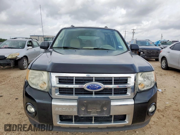 2011 Ford Escape Limited с VIN 1FMCU0EG1BKC04154, выставлен на аукционе Copart как лот 63944145 с пробегом 157 709 миль миль и Списание • Salvage title. История ставок и продаж доступна на DreamBid. Изображение 5.