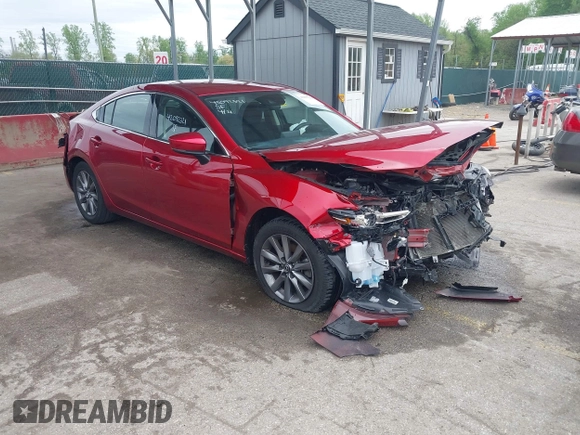 2020 Mazda 6 Sport with VIN JM1GL1UM9L1526019, listed as a IAAI auction lot 42092321 with 73,660 mi miles and . Bid and sale history available at DreamBid. Image 1.