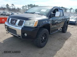 2007 Nissan Titan LE with VIN 1N6BA07B47N238148, listed as a IAAI auction lot 41683144 with 149,655 mi miles. Bid and sale history available at carsss.com. Image 2.