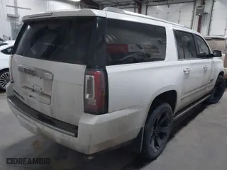 2016 GMC Yukon XL Denali with VIN 1GKS2HKJ0GR179318, listed as a IAAI auction lot 41292952 with 163,636 mi miles. Bid and sale history available at carsss.com. Image 4.