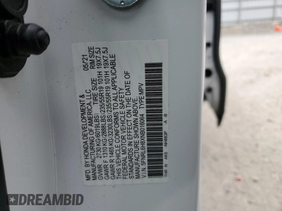 2022 Honda Odyssey Touring with VIN 5FNRL6H8XNB016064, listed as a Copart auction lot 65289595 with 24,946 mi miles and Salvage title. Bid and sale history available at DreamBid. Image 13.