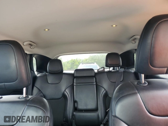 2019 Jeep Cherokee Latitude Plus z VIN 1C4PJLLB5KD226718, wystawiony jako Copart lot #62527585 z przebiegiem 99 990 mil mil oraz Szkoda całkowita • Salvage title. Historia ofert i sprzedaży dostępna na DreamBid. Obrazek 10.