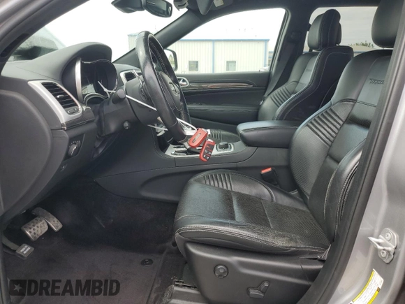 2018 Jeep Grand Cherokee Trackhawk with VIN 1C4RJFN91JC223825, listed as a Copart auction lot 58011465 with 83,177 mi miles and Salvage title. Bid and sale history available at DreamBid. Image 7.