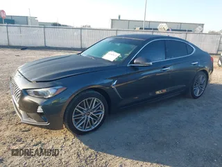 2020 Genesis G70 2.0T z VIN KMTG64LA6LU059951, wystawiony jako IAAI lot #41683671 z przebiegiem 43 852 mil mil oraz . Historia ofert i sprzedaży dostępna na DreamBid. Obrazek 2.