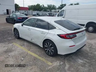 2023 Honda Civic EX-L with VIN 19XFL1H70PE014510, listed as a IAAI auction lot 42395890 with 14,163 mi miles and . Bid and sale history available at DreamBid. Image 3.