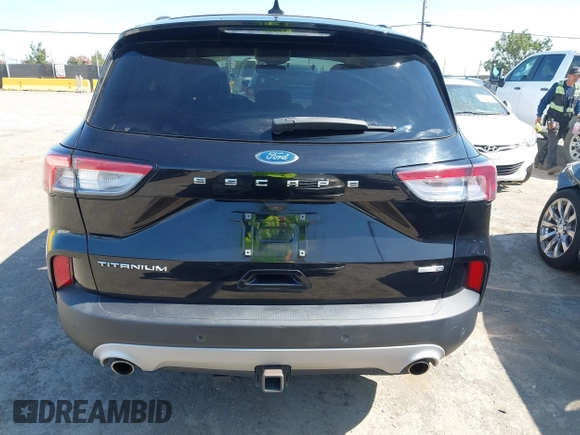 2020 Ford Escape Titanium z VIN 1FMCU9J97LUB18350, wystawiony jako IAAI lot #42574736 z przebiegiem 82 551 mil mil oraz . Historia ofert i sprzedaży dostępna na DreamBid. Obrazek 17.
