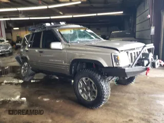 1998 Jeep Grand Cherokee Limited with VIN 1J4GZ78S9WC308708, listed as a Copart auction lot 79315694 with 205,976 mi miles and Salvage Title. Bid and sale history available at carsss.com. Image 4.