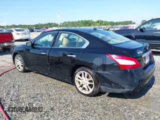 2011 Nissan Maxima SV with VIN 1N4AA5APXBC858867, listed as a IAAI auction lot 42612007 with 201,235 mi miles and . Bid and sale history available at DreamBid. Image 3.