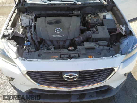 2016 Mazda CX-3 Touring with VIN JM1DKDC71G0130858, listed as a Copart auction lot 52047765 with 115,299 mi miles and Salvage Title. Bid and sale history available at carsss.com. Image 14.