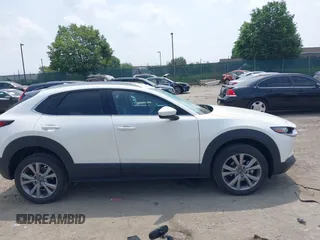 2021 Mazda CX-30 Premium with VIN 3MVDMBDL0MM307045, listed as a IAAI auction lot 42446494 with 33,112 mi miles and . Bid and sale history available at DreamBid. Image 14.