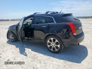 2012 Cadillac SRX Performance Collection with VIN 3GYFNBE34CS609643, listed as a Copart auction lot 57223065 with 182,072 mi miles and Salvage title. Bid and sale history available at DreamBid. Image 2.