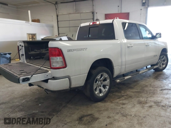 2021 Ram 1500 Big Horn with VIN 1C6SRFFTXMN780608, listed as a IAAI auction lot 41342815 with 70,406 mi miles and . Bid and sale history available at DreamBid. Image 4.