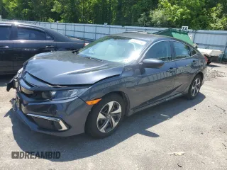 2021 Honda Civic LX with VIN 2HGFC2F60MH519187, listed as a Copart auction lot 59307765 with 65,670 mi miles and Salvage title. Bid and sale history available at DreamBid. Image 1.