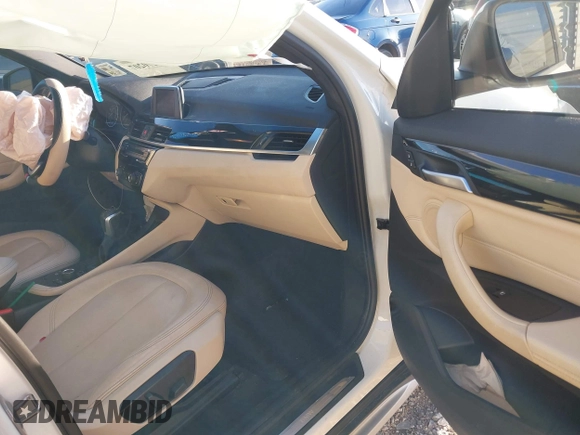 2018 BMW X1 sDrive28i with VIN WBXHU7C36J5H41267, listed as a IAAI auction lot 41270207 with 84,726 mi miles. Bid and sale history available at carsss.com. Image 5.