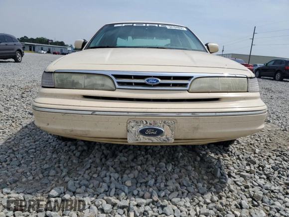 1996 Ford Crown Victoria LX с VIN 2FALP74W1TX192976, выставлен на аукционе Copart как лот 56104895 с пробегом 144 011 миль миль и Списание • Salvage title. История ставок и продаж доступна на DreamBid. Изображение 5.