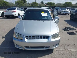 2002 Hyundai Accent GL with VIN KMHCG45C82U268756, listed as a IAAI auction lot 41569829 with 89,752 mi miles. Bid and sale history available at carsss.com. Image 12.