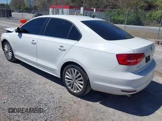 2015 Volkswagen Jetta SE with VIN 3VWD07AJ8FM284756, listed as a IAAI auction lot 42038453 with 127,112 mi miles and . Bid and sale history available at DreamBid. Image 3.