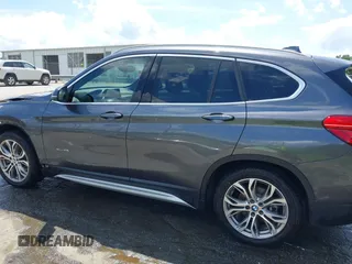 2017 BMW X1 xDrive28i with VIN WBXHT3Z38H4A55086, listed as a IAAI auction lot 42459276 with 101,907 mi miles and . Bid and sale history available at DreamBid. Image 14.