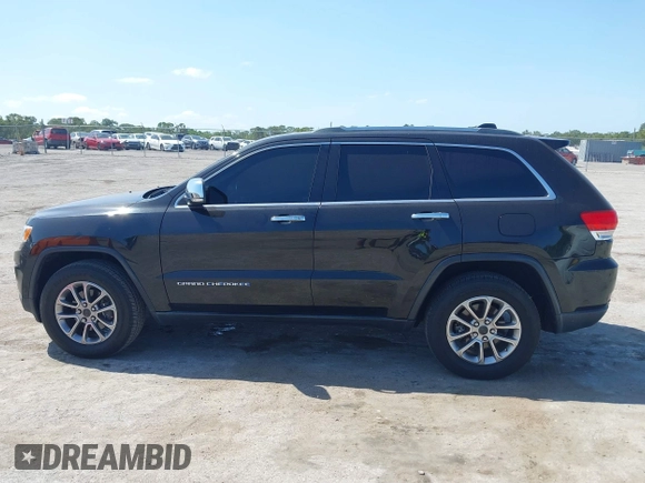2015 Jeep Grand Cherokee Limited with VIN 1C4RJFBG8FC790575, listed as a IAAI auction lot 42124709 with 248,827 mi miles. Bid and sale history available at carsss.com. Image 14.