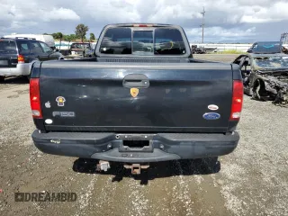 2001 Ford F-150 XL with VIN 1FTRX17W91NB71630, listed as a Copart auction lot 56583545 with 209,009 mi miles and Salvage title. Bid and sale history available at DreamBid. Image 6.