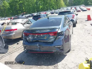 2021 Kia Forte GT-Line z VIN 3KPF34AD2ME341973, wystawiony jako IAAI lot #42084462 z przebiegiem 61 542 mil mil oraz . Historia ofert i sprzedaży dostępna na DreamBid. Obrazek 6.