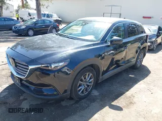 2020 Mazda CX-9 Sport with VIN JM3TCABY8L0407430, listed as a IAAI auction lot 42288490 with 50,317 mi miles and . Bid and sale history available at DreamBid. Image 20.