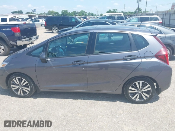 2015 Honda Fit EX-L with VIN 3HGGK5H80FM727081, listed as a IAAI auction lot 42232315 with 57,906 mi miles and . Bid and sale history available at DreamBid. Image 14.