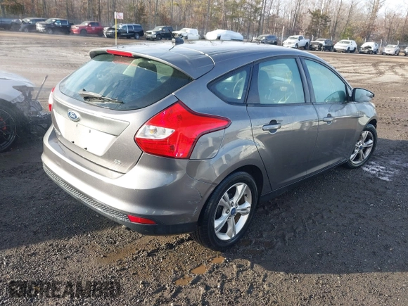 2013 Ford Focus SE with VIN 1FADP3K28DL112777, listed as a IAAI auction lot 41386940 with 107,893 mi miles. Bid and sale history available at carsss.com. Image 4.