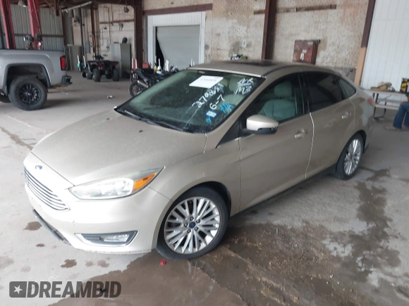 2017 Ford Focus Titanium with VIN 1FADP3J26HL279839, listed as a IAAI auction lot 42466826 with 202,795 mi miles and . Bid and sale history available at DreamBid. Image 17.