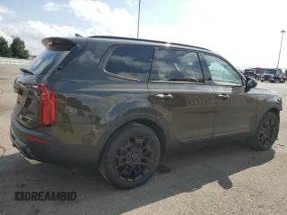 2021 Kia Telluride SX with VIN 5XYP5DHC6MG186195, listed as a Copart auction lot 59906235 with 77,626 mi miles and Salvage title. Bid and sale history available at DreamBid. Image 3.