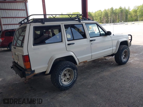 1996 Jeep Cherokee Sport with VIN 1J4FJ68S5TL259449, listed as a IAAI auction lot 42376697 with 72,835 mi miles and . Bid and sale history available at DreamBid. Image 4.