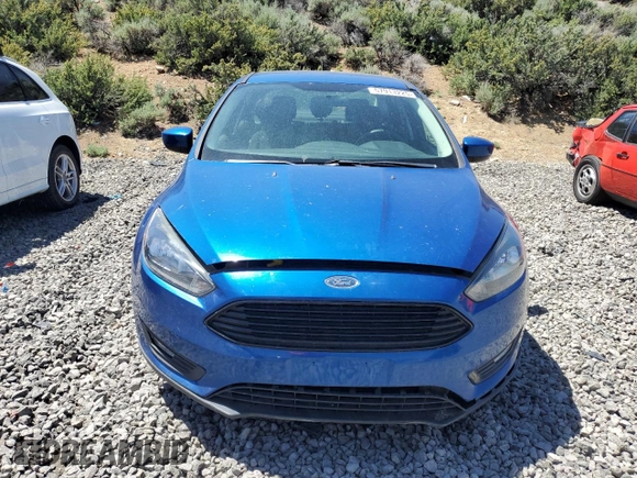 2018 Ford Focus SE z VIN 1FADP3FE1JL246725, wystawiony jako Copart lot #57913225 z przebiegiem 52 247 mil mil oraz Czysty tytuł • Clean title. Historia ofert i sprzedaży dostępna na DreamBid. Obrazek 5.