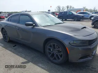 2023 Dodge Charger SXT z VIN 2C3CDXBG1PH598436, wystawiony jako IAAI lot #42126866 z przebiegiem 22 304 mil mil oraz . Historia ofert i sprzedaży dostępna na DreamBid. Obrazek 1.