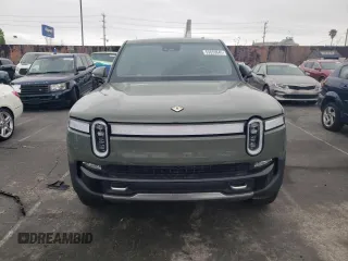 2022 Rivian R1T Launch Edition z VIN 7FCTGAAL0NN001256, wystawiony jako Copart lot #55850845 z przebiegiem 49 236 mil mil oraz Szkoda całkowita • Salvage title. Historia ofert i sprzedaży dostępna na DreamBid. Obrazek 5.