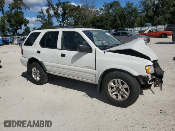 2002 Isuzu Rodeo S with VIN 4S2CK58W124322241, listed as a Copart auction lot 79009994 with 131,793 mi miles and Salvage Title. Bid and sale history available at DreamBid. Image 4.