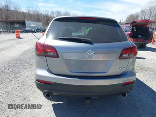 2015 Mazda CX-9 Sport with VIN JM3TB2BA7F0450544, listed as a IAAI auction lot 41812565 with 81,727 mi miles and . Bid and sale history available at carsss.com. Image 16.