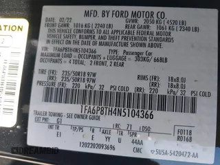 2022 Ford Mustang EcoBoost with VIN 1FA6P8TH4N5104366, listed as a IAAI auction lot 41657715 with 61,083 mi miles. Bid and sale history available at carsss.com. Image 9.