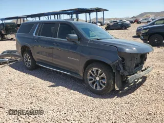 2022 Chevrolet Suburban LT with VIN 1GNSKCKDXNR317511, listed as a Copart auction lot 52573795 with 134,062 mi miles and Salvage Title. Bid and sale history available at DreamBid. Image 4.