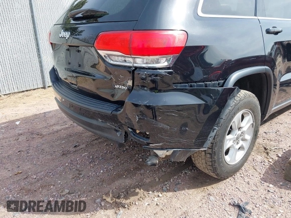 2017 Jeep Grand Cherokee Laredo with VIN 1C4RJFAGXHC863904, listed as a IAAI auction lot 41914465 with 122,981 mi miles. Bid and sale history available at carsss.com. Image 6.