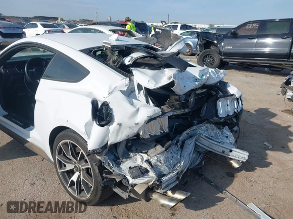 2021 Ford Mustang EcoBoost z VIN 1FA6P8TD5M5133239, wystawiony jako IAAI lot #41899042 z przebiegiem 65 553 mil mil oraz . Historia ofert i sprzedaży dostępna na DreamBid. Obrazek 6.