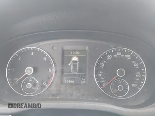 2015 Volkswagen Passat SE z VIN 1VWBV7A37FC072619, wystawiony jako IAAI lot #42389938 z przebiegiem 159 709 mil mil oraz . Historia ofert i sprzedaży dostępna na DreamBid. Obrazek 7.