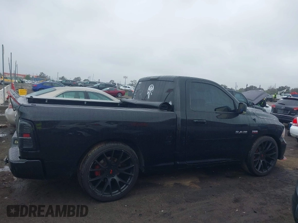 2015 Ram 1500 Sport with VIN 3C6JR6CTXFG631370, listed as a IAAI auction lot 41351518 with 65,375 mi miles and . Bid and sale history available at DreamBid. Image 13.