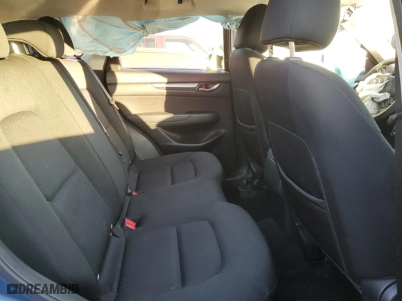 2017 Mazda CX-5 Sport with VIN JM3KFBBL6H0129258, listed as a Copart auction lot 80687694 with 106,120 mi miles and Salvage Title. Bid and sale history available at carsss.com. Image 11.