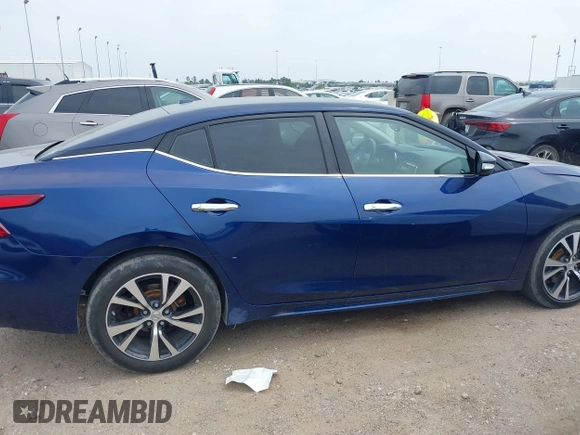 2016 Nissan Maxima S with VIN 1N4AA6AP4GC445341, listed as a IAAI auction lot 41890630 with 121,115 mi miles and . Bid and sale history available at DreamBid. Image 14.